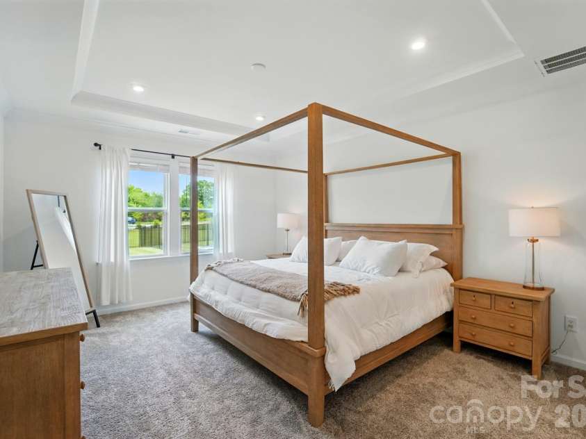 11113 Godwit Lane, Charlotte, NC 28278.  MLS# CAR4268696, YatesRealty ID 2283. Master bed main floor 