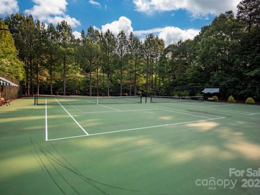 16013 Wynfield Creek Parkway, Huntersville, NC 28078.  MLS# CAR4268989, YatesRealty ID 22830. Tennis courts with lines for pickleball