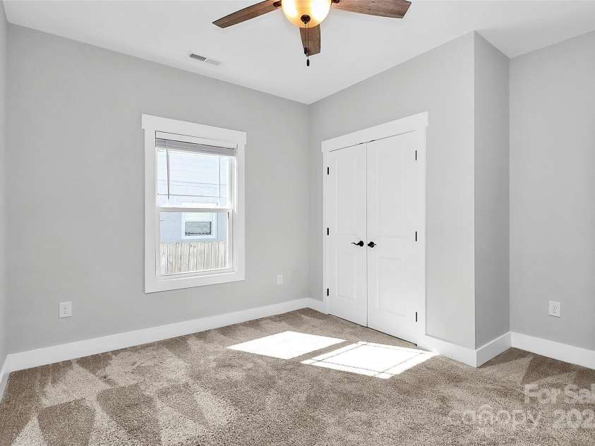 323 Keswick Avenue, Charlotte, NC 28206.  MLS# CAR4271562, YatesRealty ID 22833. Bedroom #3 - Perfect for a Home Office, Playroom, or Gym!