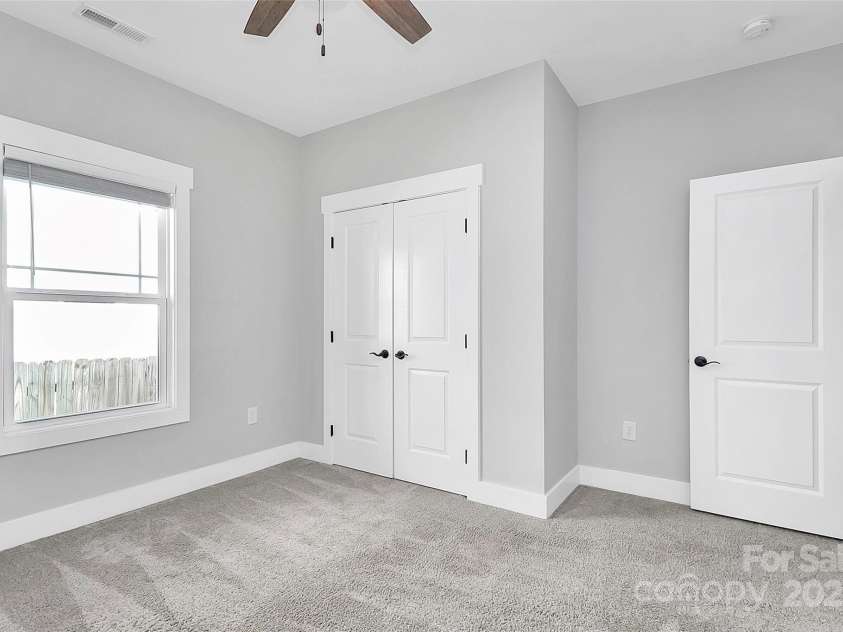 323 Keswick Avenue, Charlotte, NC 28206.  MLS# CAR4271562, YatesRealty ID 22833. Bedroom #3 - Perfect for a Home Office, Playroom, or Gym!