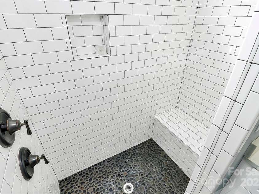323 Keswick Avenue, Charlotte, NC 28206.  MLS# CAR4271562, YatesRealty ID 22833. Custom Over-Size Shower with built in bench