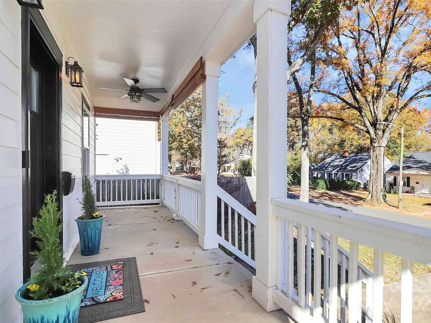 323 Keswick Avenue, Charlotte, NC 28206.  MLS# CAR4271562, YatesRealty ID 22833. Large covered front porch complete with fans, shades, and all the Southern Charm