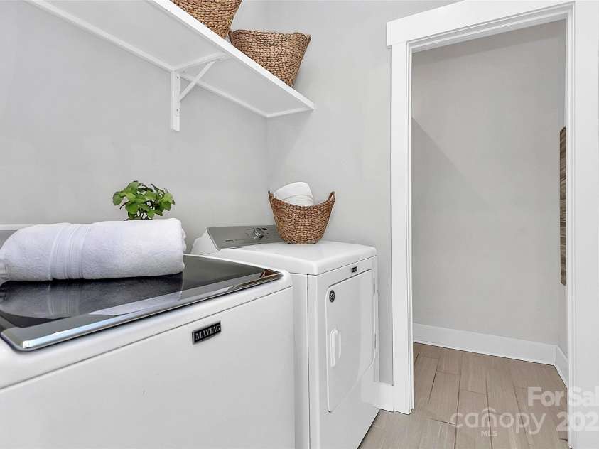 323 Keswick Avenue, Charlotte, NC 28206.  MLS# CAR4271562, YatesRealty ID 22833. Laundry Room with HUGE Utility/Storage closet