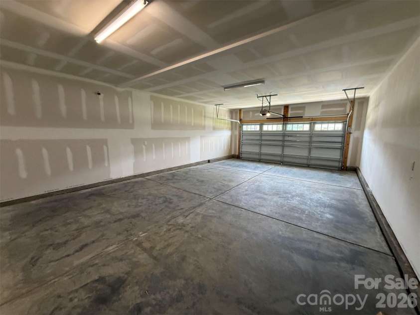 4237 Dahlia Drive, Harrisburg, NC 28075.  MLS# CAR4380418, YatesRealty ID 22837. Extended Frontload Garage