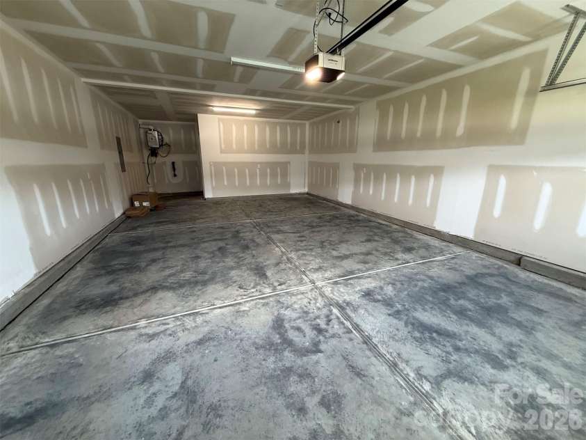 4237 Dahlia Drive, Harrisburg, NC 28075.  MLS# CAR4380418, YatesRealty ID 22837. Extended Frontload Garage