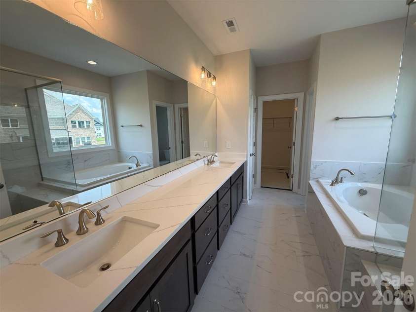 4237 Dahlia Drive, Harrisburg, NC 28075.  MLS# CAR4380418, YatesRealty ID 22837. Premier Bath