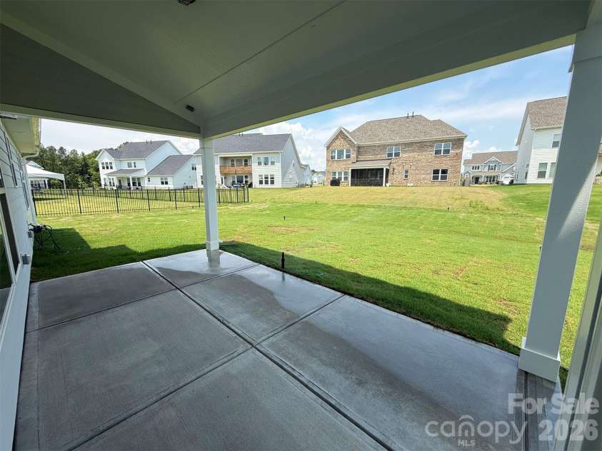 4237 Dahlia Drive, Harrisburg, NC 28075.  MLS# CAR4380418, YatesRealty ID 22837. Rear Covered Patio