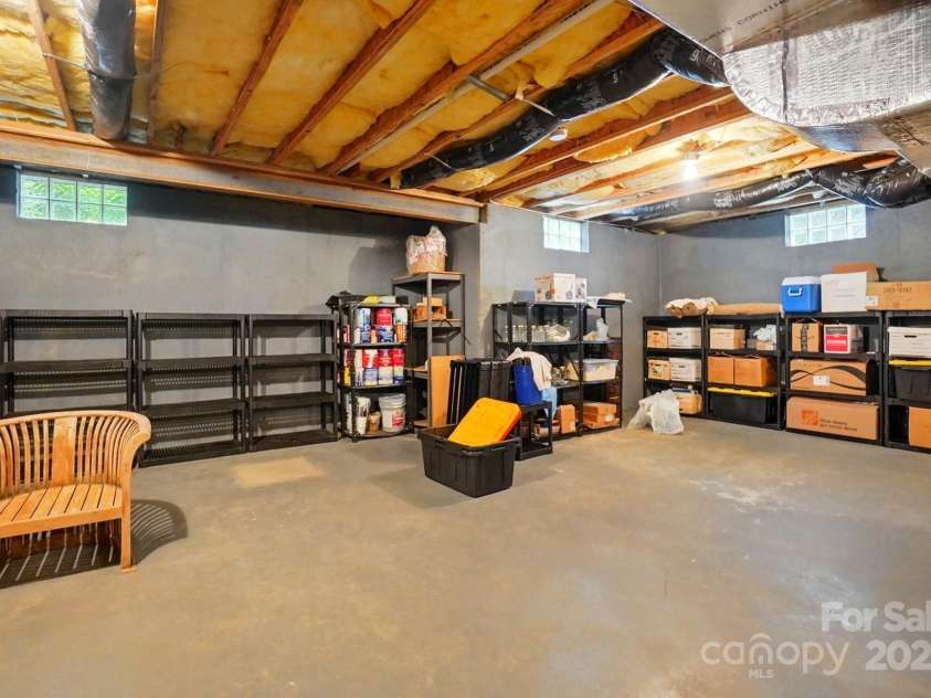 1720 Mountain Park Drive, Charlotte, NC 28214.  MLS# CAR4265620, YatesRealty ID 22843. Unfinished basement