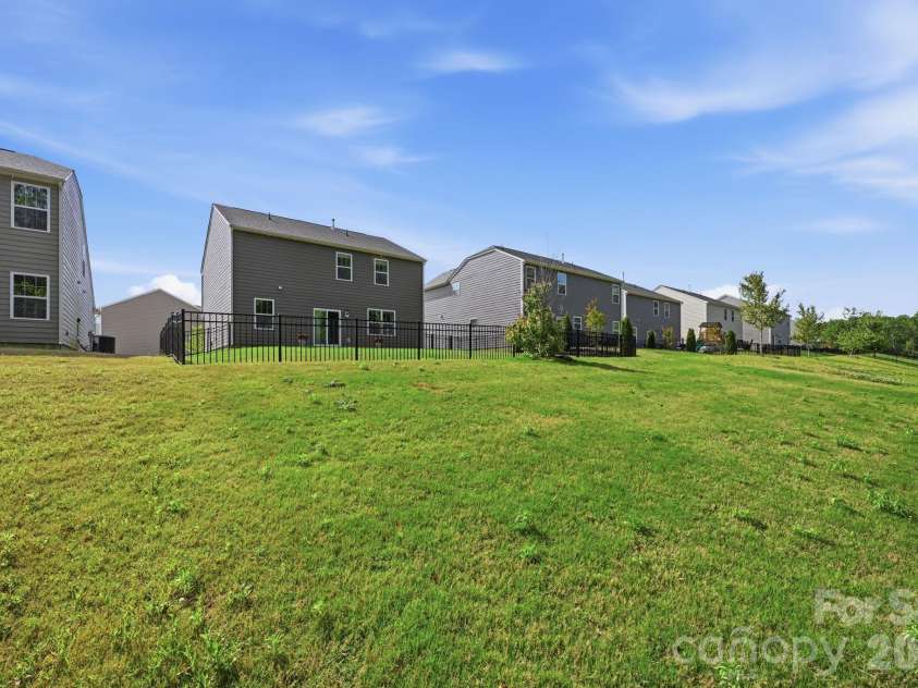 150 Scotsway Court, Troutman, NC 28166.  MLS# CAR4371353, YatesRealty ID 22844. Backyard