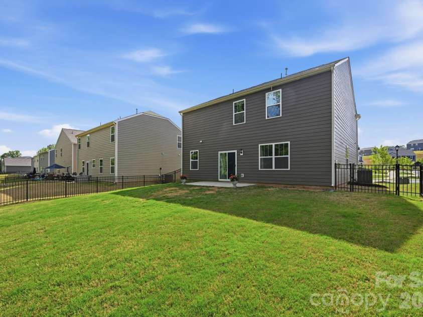 150 Scotsway Court, Troutman, NC 28166.  MLS# CAR4371353, YatesRealty ID 22844. Backyard