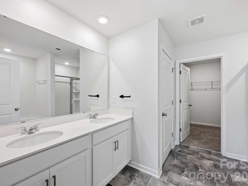 150 Scotsway Court, Troutman, NC 28166.  MLS# CAR4371353, YatesRealty ID 22844. Primary bathroom
