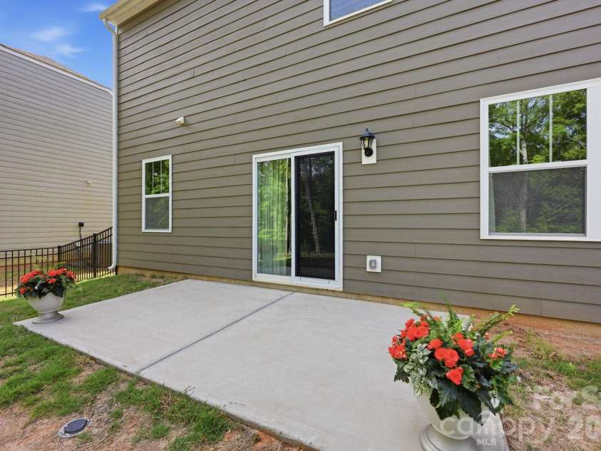 150 Scotsway Court, Troutman, NC 28166.  MLS# CAR4371353, YatesRealty ID 22844. Rear patio