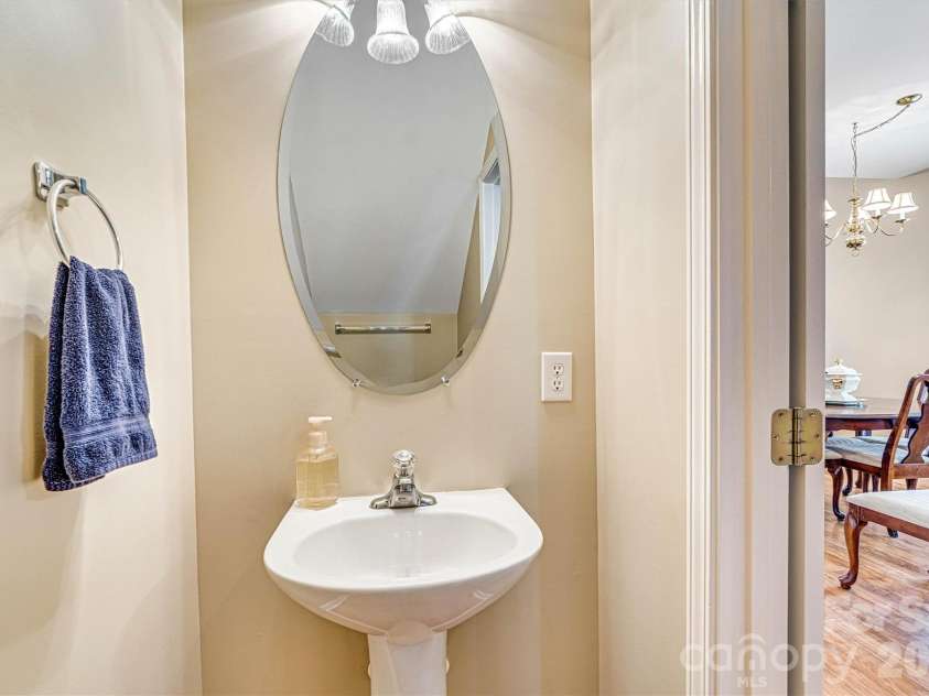 151 Talbert Town Loop, Mooresville, NC 28117.  MLS# CAR4367456, YatesRealty ID 22845. Half bath on main level
