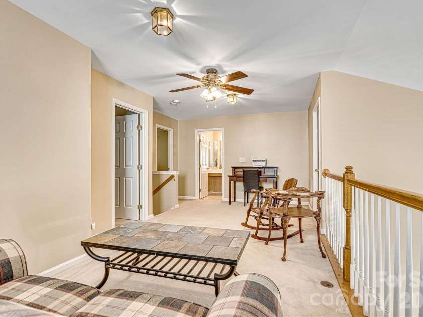 151 Talbert Town Loop, Mooresville, NC 28117.  MLS# CAR4367456, YatesRealty ID 22845. Open loft with walk-in attic storage attached