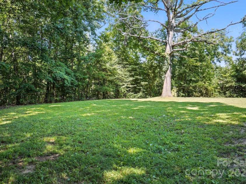 617 Rock Hill Church Road, Matthews, NC 28104.  MLS# CAR4274427, YatesRealty ID 22850. Privacy