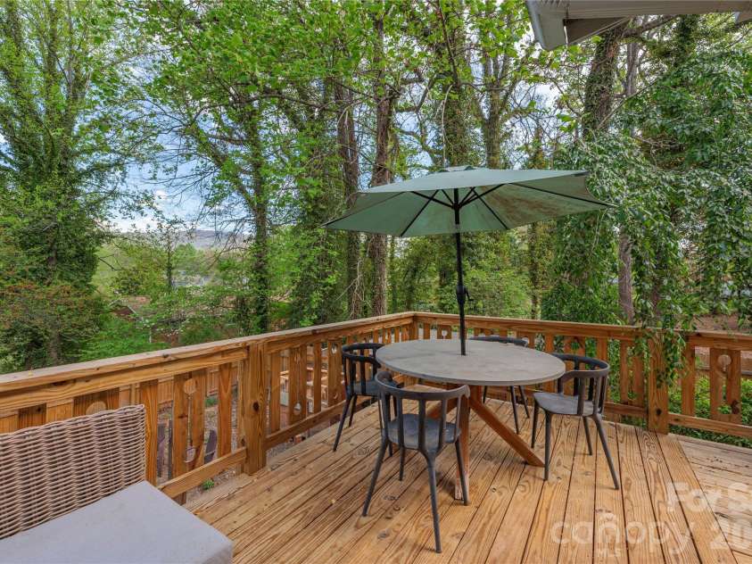 12 Oteen Church Road, Asheville, NC 28805.  MLS# CAR4358612, YatesRealty ID 22851. 2023 back deck 