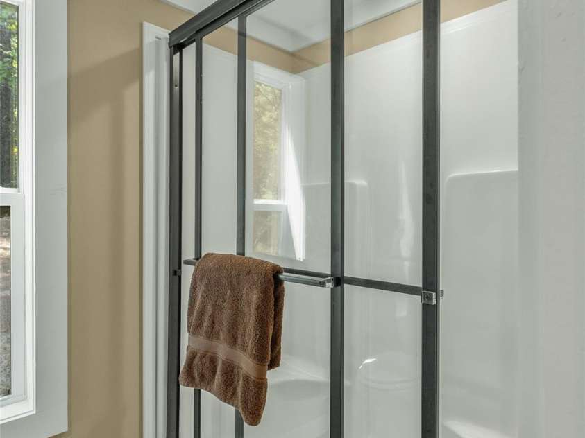 3095 Silversteen Road, Lake Toxaway, NC 28747.  MLS# CAR4269912, YatesRealty ID 22856. Main Bathroom Shower