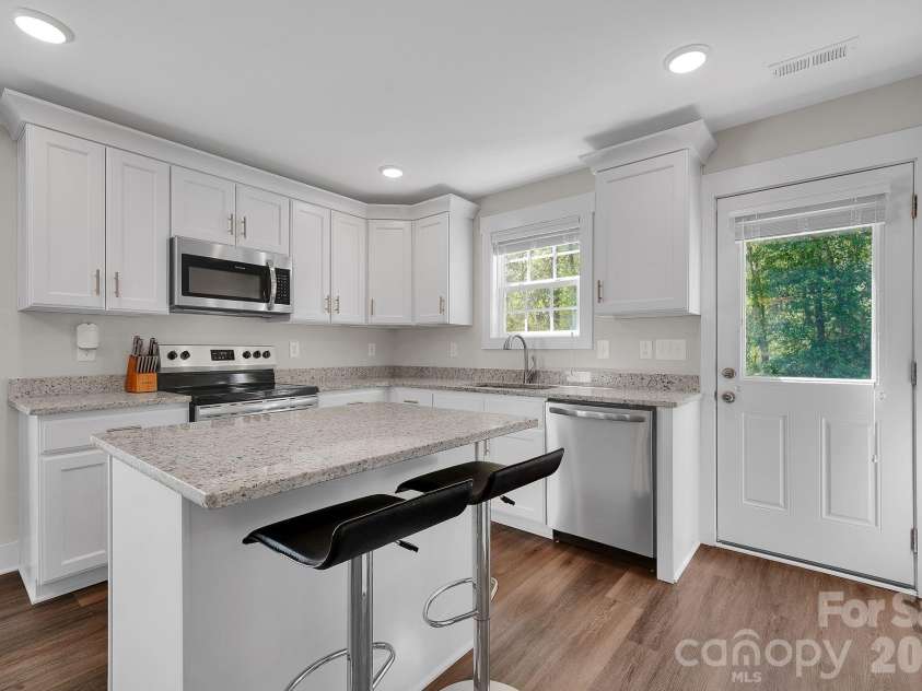 2877 Vale Avenue, Kannapolis, NC 28081.  MLS# CAR4366966, YatesRealty ID 22857. SS Appliances, granite counters, and beautiful cabinetry! Fridge included