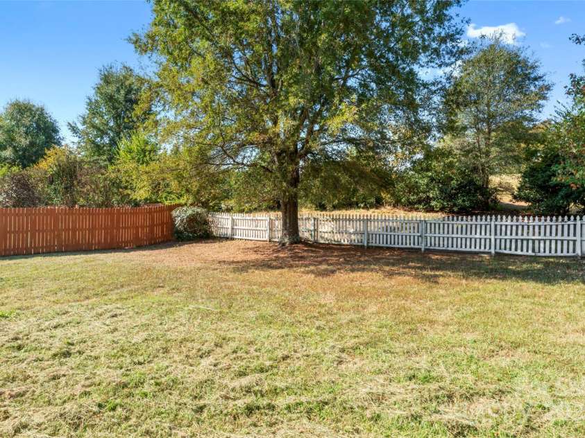 4835 Chesney Street, Concord, NC 28027.  MLS# CAR4307109, YatesRealty ID 22858. Back Yard