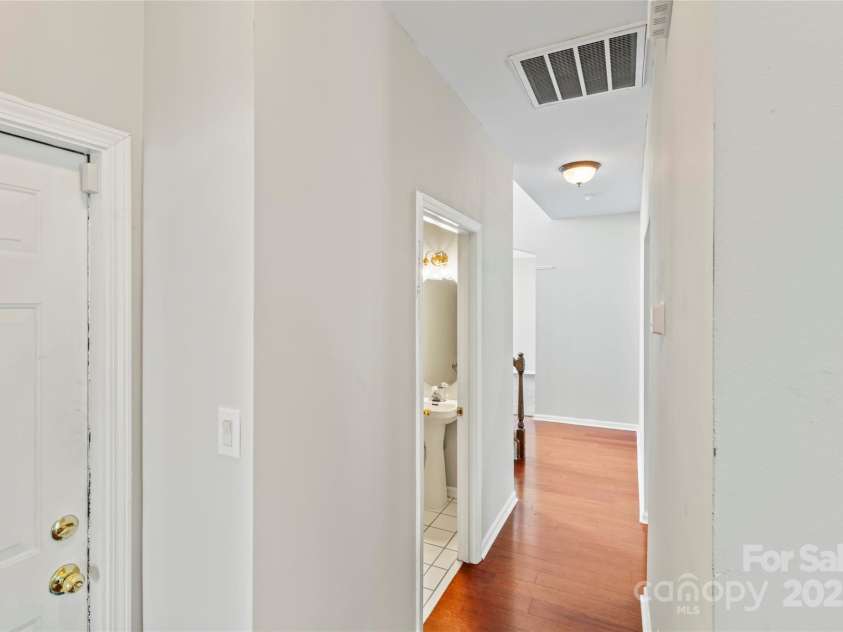 4835 Chesney Street, Concord, NC 28027.  MLS# CAR4307109, YatesRealty ID 22858. Downstairs Hallway