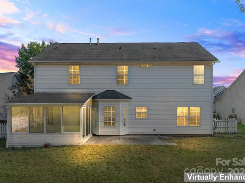 4835 Chesney Street, Concord, NC 28027.  MLS# CAR4307109, YatesRealty ID 22858. Twilight Back View