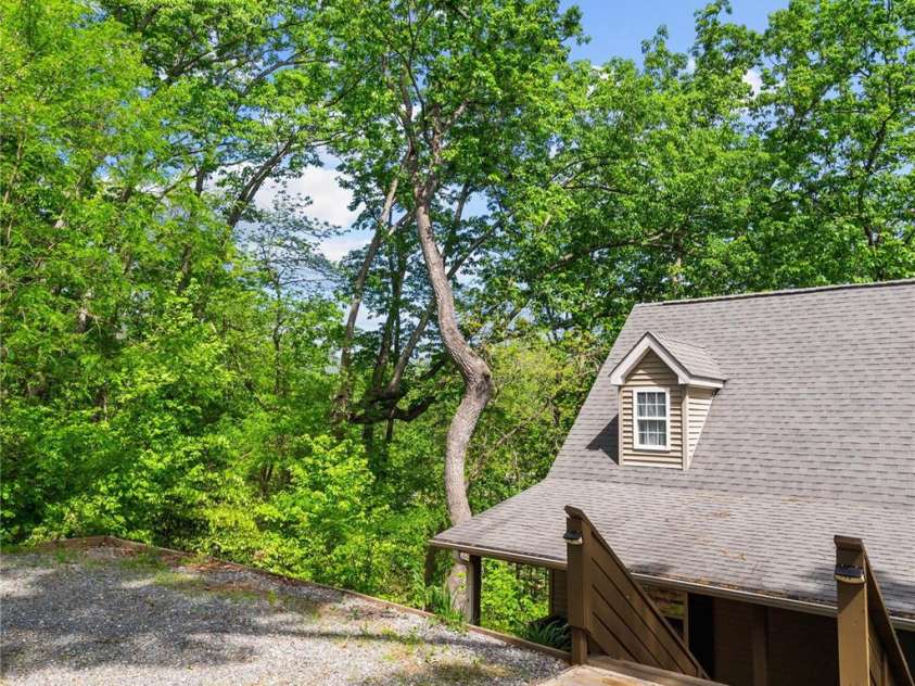 419 Hidden Hill Road, Tryon, NC 28782.  MLS# CAR4250094, YatesRealty ID 22859. 