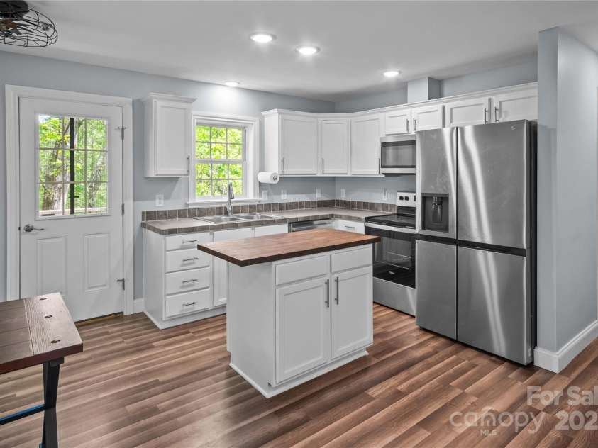 419 Hidden Hill Road, Tryon, NC 28782.  MLS# CAR4250094, YatesRealty ID 22859. 