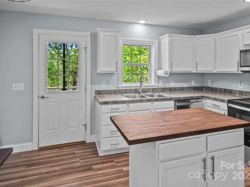 419 Hidden Hill Road, Tryon, NC 28782.  MLS# CAR4250094, YatesRealty ID 22859. 