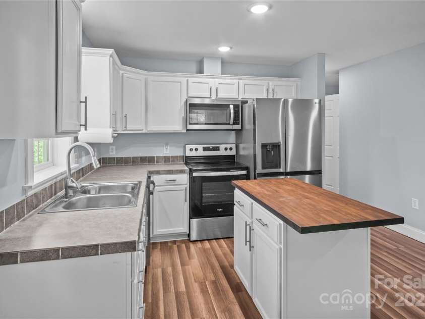 419 Hidden Hill Road, Tryon, NC 28782.  MLS# CAR4250094, YatesRealty ID 22859. 