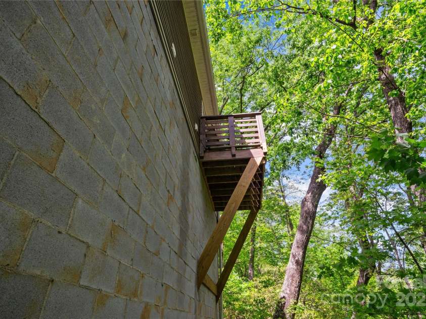 419 Hidden Hill Road, Tryon, NC 28782.  MLS# CAR4250094, YatesRealty ID 22859. 