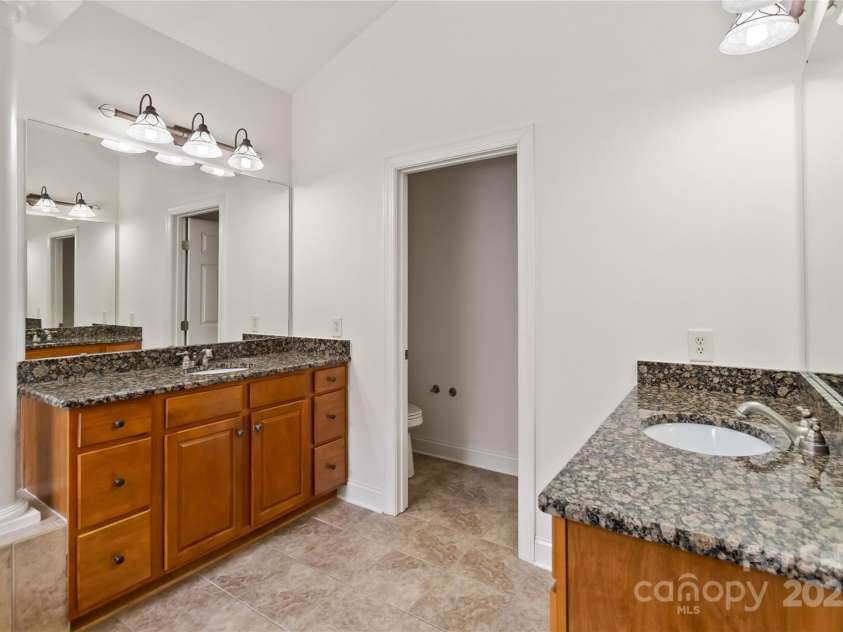 7302 Yellowhorn Trail, Waxhaw, NC 28173.  MLS# CAR4245057, YatesRealty ID 22861. Primary bathroom with separated vanities