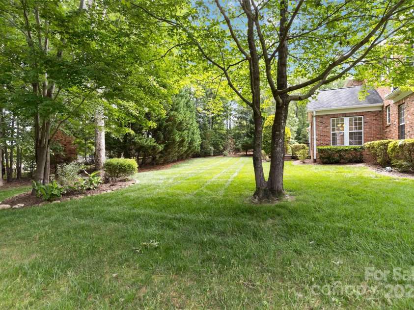 7302 Yellowhorn Trail, Waxhaw, NC 28173.  MLS# CAR4245057, YatesRealty ID 22861. Private backyard