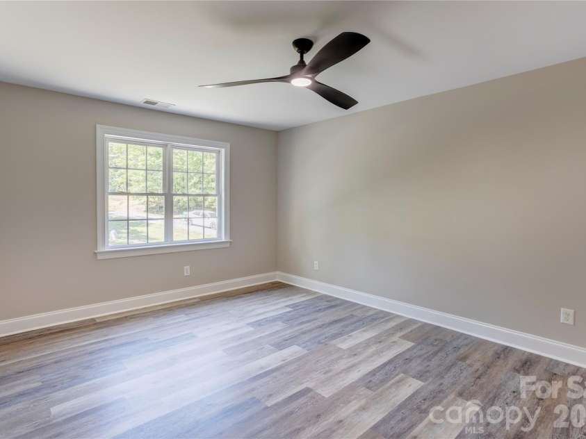 7611 Mount Olive Road, Concord, NC 28025.  MLS# CAR4378883, YatesRealty ID 22861. Upstairs bedroom 1