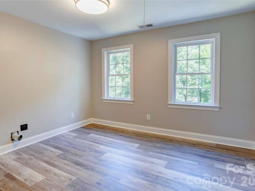 7611 Mount Olive Road, Concord, NC 28025.  MLS# CAR4378883, YatesRealty ID 22861. Upstairs Laundry Room