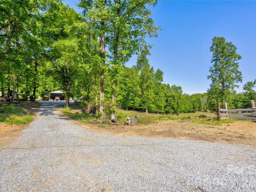 7611 Mount Olive Road, Concord, NC 28025.  MLS# CAR4378883, YatesRealty ID 22861. View from barns to house