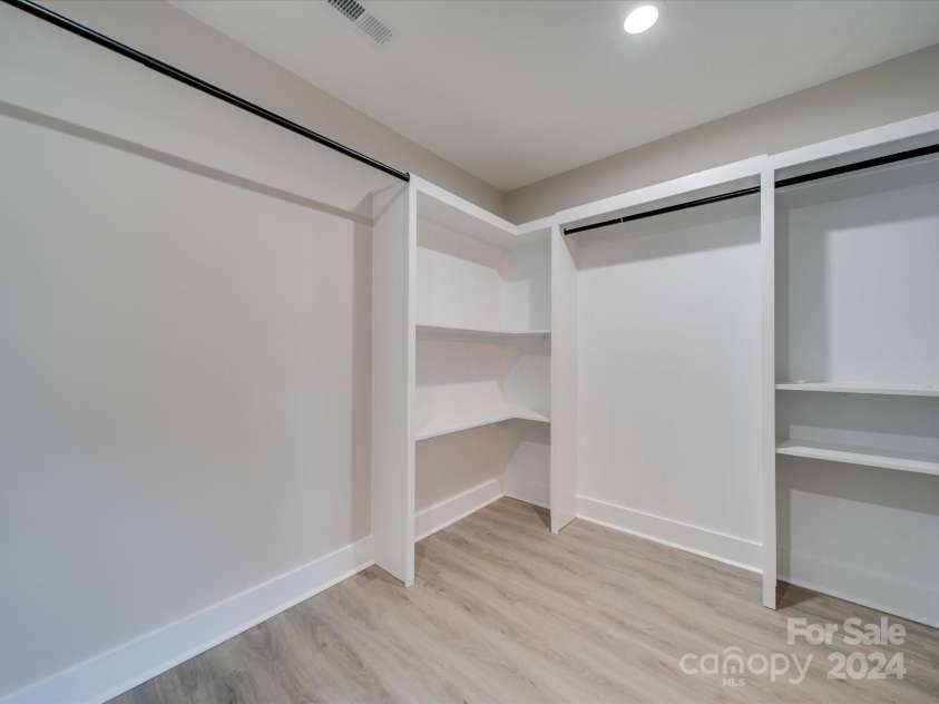 40 Ridgecrest Avenue, Peachland, NC 28133.  MLS# CAR4188767, YatesRealty ID 22862. Custom primary closet