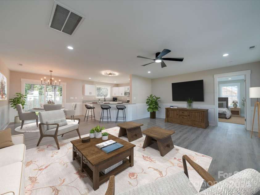 40 Ridgecrest Avenue, Peachland, NC 28133.  MLS# CAR4188767, YatesRealty ID 22862. Virtually staged living room