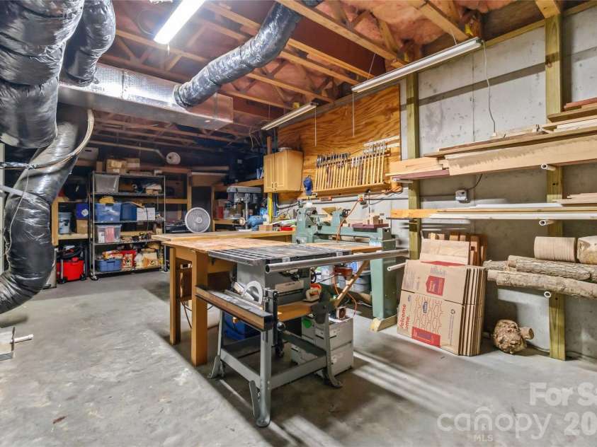 10719 Waycross Drive, Huntersville, NC 28078.  MLS# CAR4358918, YatesRealty ID 22863. Basement storage/work space