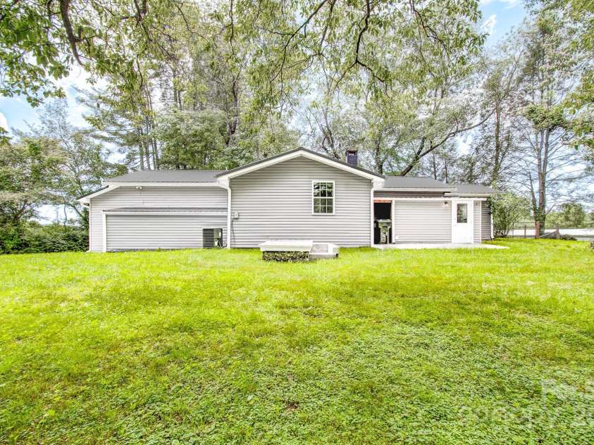 51 Alfson Circle, Hendersonville, NC 28792.  MLS# CAR4264080, YatesRealty ID 22863. Backyard