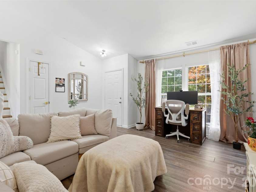 1007 Great Falls Drive, Monroe, NC 28110.  MLS# CAR4382454, YatesRealty ID 22866. Cozy front living room