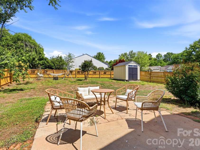 1007 Great Falls Drive, Monroe, NC 28110.  MLS# CAR4382454, YatesRealty ID 22866. Fully fenced, level backyard- so many outdoor possibilities!
