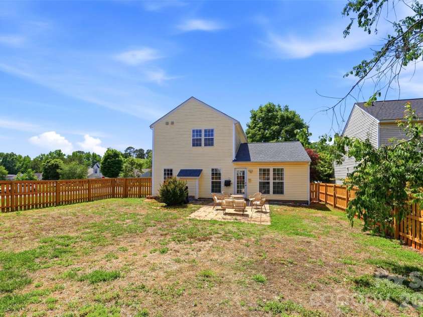 1007 Great Falls Drive, Monroe, NC 28110.  MLS# CAR4382454, YatesRealty ID 22866. Fully fenced, level backyard- so many outdoor possibilities!