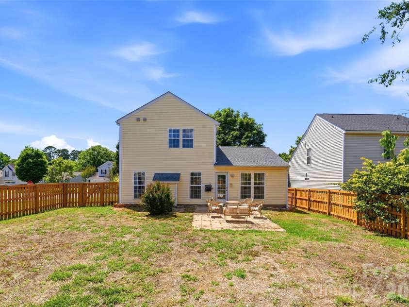 1007 Great Falls Drive, Monroe, NC 28110.  MLS# CAR4382454, YatesRealty ID 22866. Fully fenced, level backyard- so many outdoor possibilities!