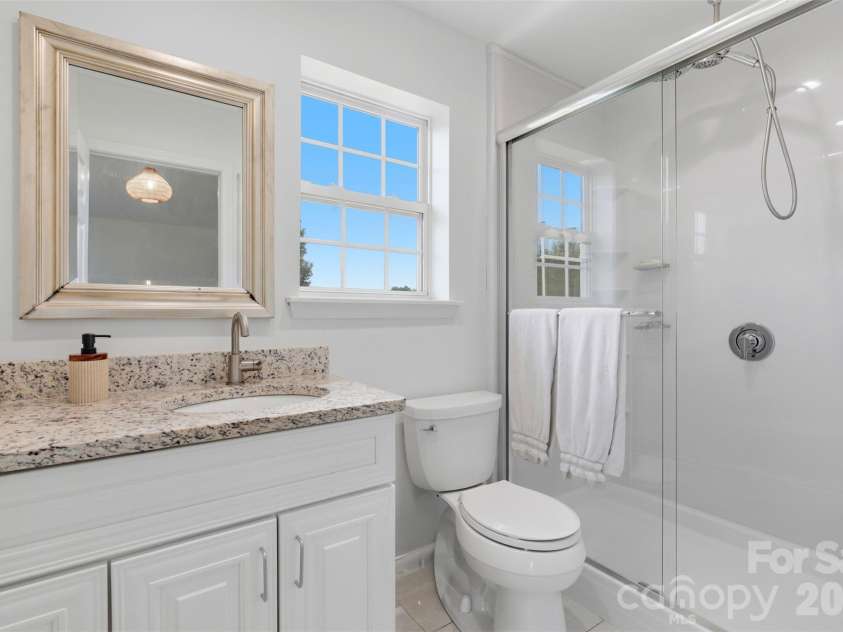 1007 Great Falls Drive, Monroe, NC 28110.  MLS# CAR4382454, YatesRealty ID 22866. Primary ensuite bath