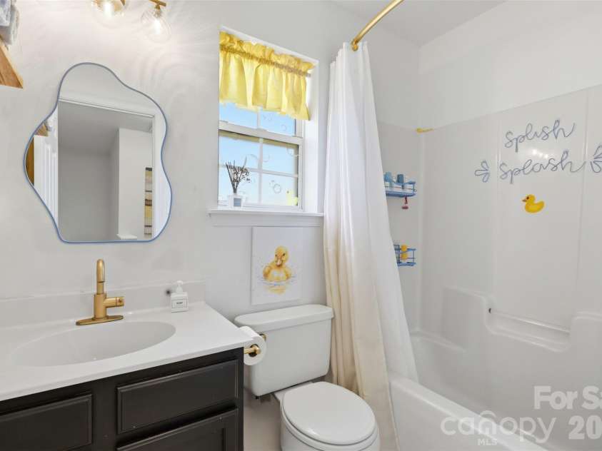 1007 Great Falls Drive, Monroe, NC 28110.  MLS# CAR4382454, YatesRealty ID 22866. Second full bath