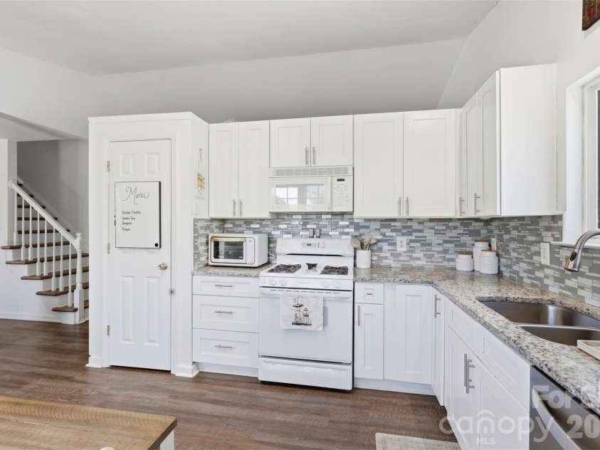 1007 Great Falls Drive, Monroe, NC 28110.  MLS# CAR4382454, YatesRealty ID 22866. Thoughtfully updated kitchen