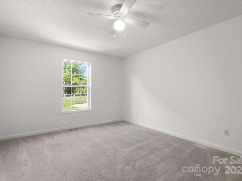 318 Huffman Road, Gastonia, NC 28056.  MLS# CAR4250230, YatesRealty ID 22875. Primary Bedroom