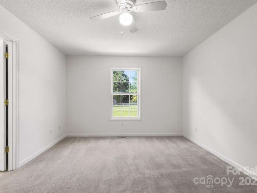 318 Huffman Road, Gastonia, NC 28056.  MLS# CAR4250230, YatesRealty ID 22875. Primary Bedroom