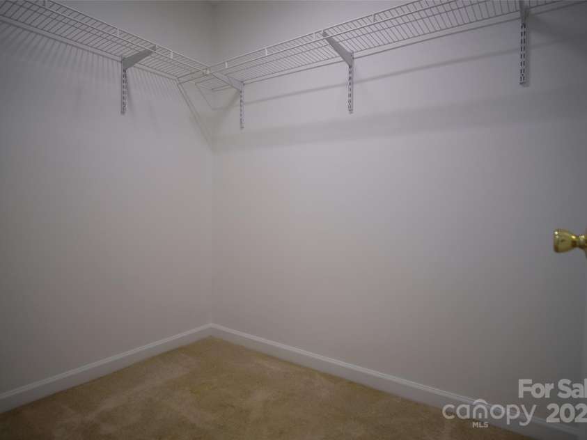 318 Huffman Road, Gastonia, NC 28056.  MLS# CAR4297104, YatesRealty ID 22875. Large walk-in closet 