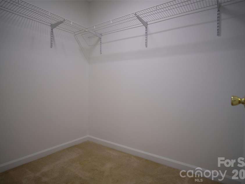 318 Huffman Road, Gastonia, NC 28056.  MLS# CAR4297104, YatesRealty ID 22875. Large walk-in closet 